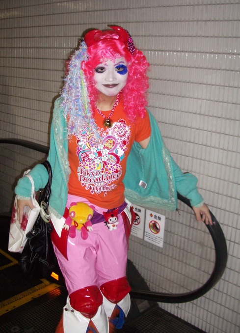 Shironuri girl leaving Shinjuku station, Tokyo, 2002