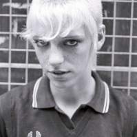 Skinhead girl, King's Rd, London, 80s ST#413