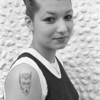 Punk girl with 'Catwoman' tattoo and hairstyle ST#155