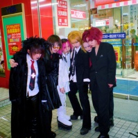 Hanging out outside convenience store, Sapporo, Japan, 2000