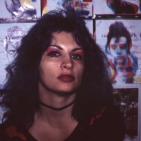 Shop assistant in Punkish shop on or near St Marks Place, NYC, 1981 ST#181