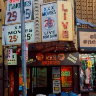 Porn movie theaters and garbage, 42nd Street, New York City, USA, 1984 [photo © Ted Polhemus]